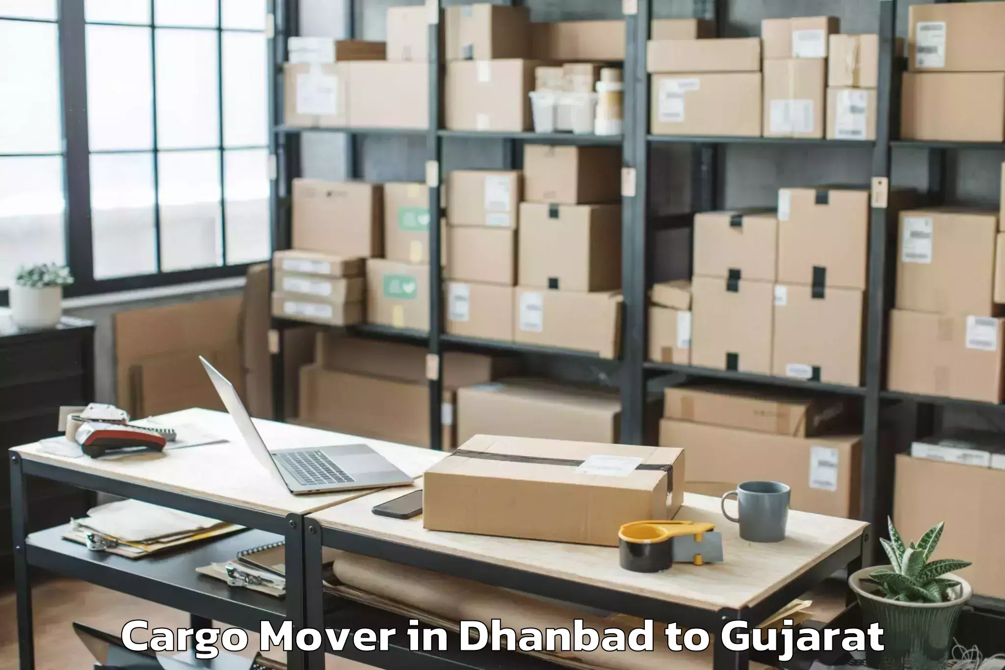 Top Dhanbad to Balasinor Cargo Mover Available